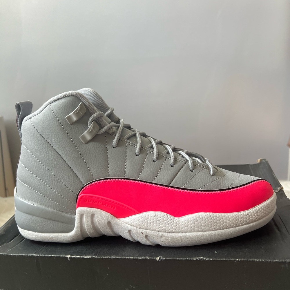 Pink and grey Jordan 12s retro